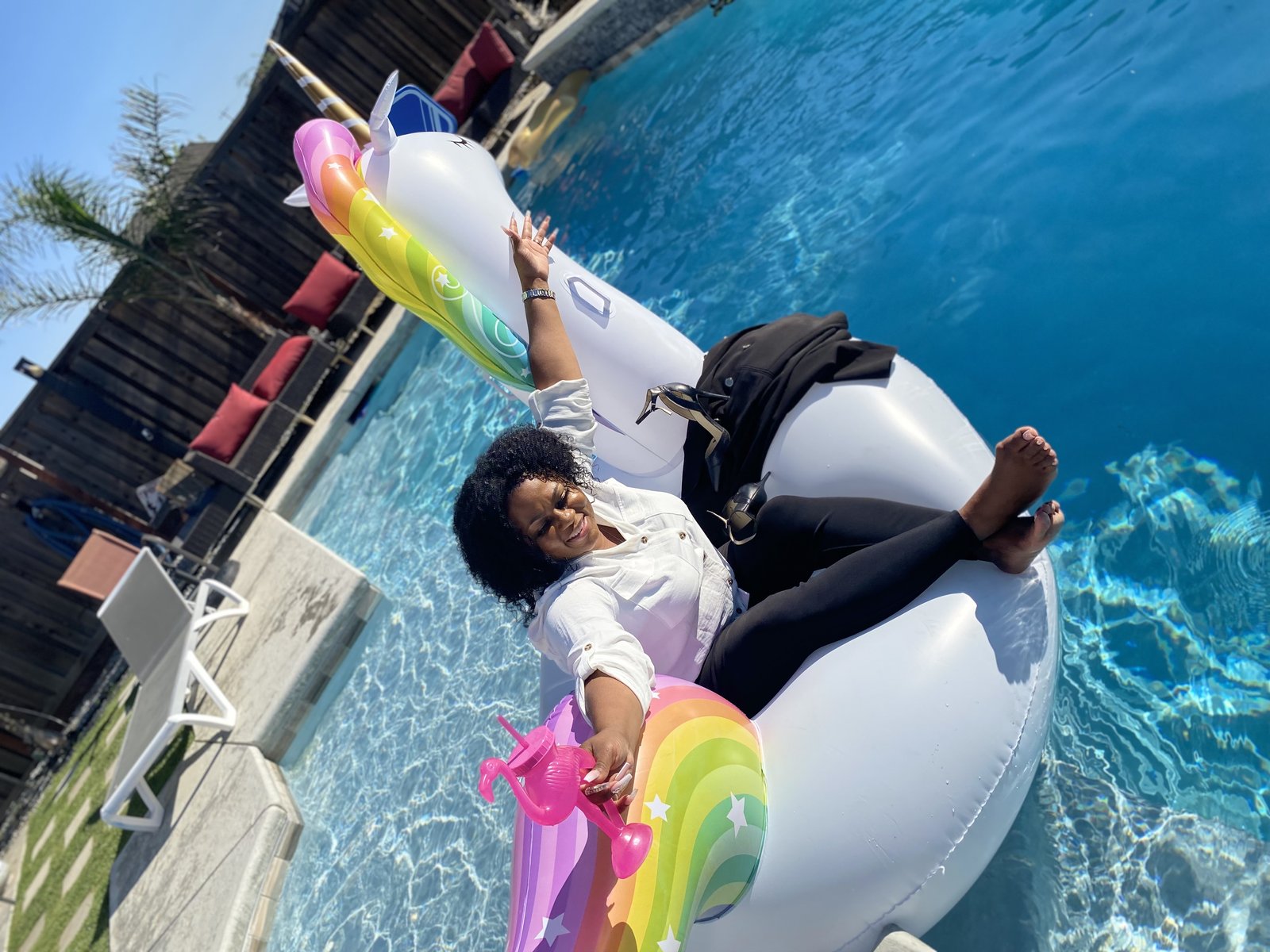 Michele on the float, arms open