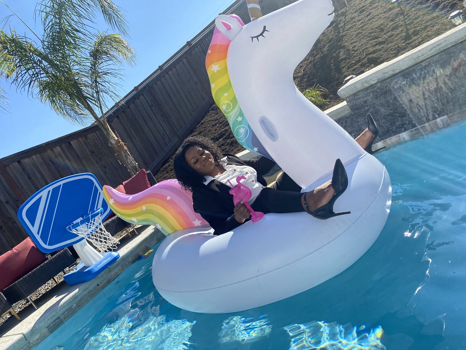 Michele on the float in a blazer